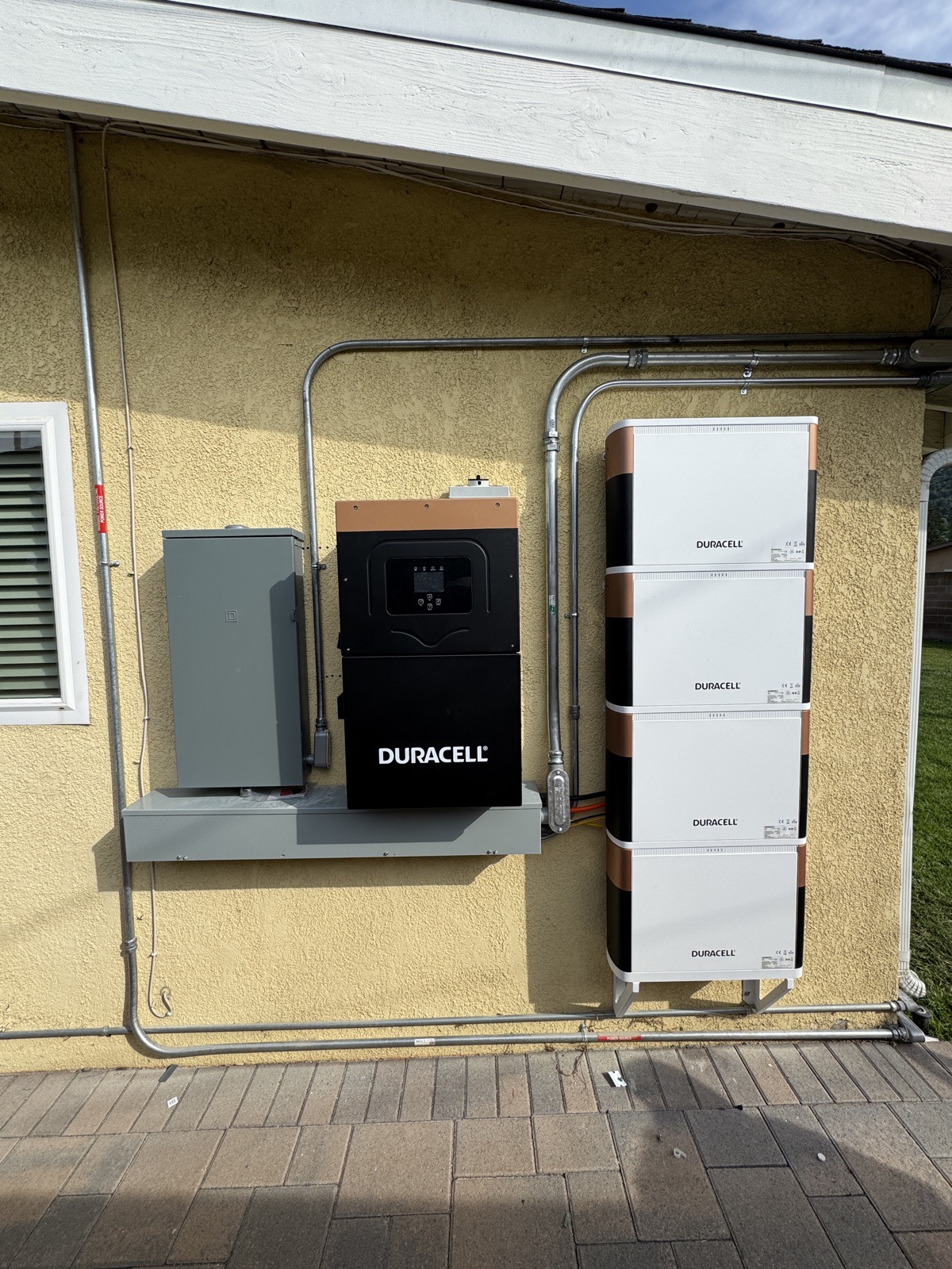 Duracell battery install - wall-mounted 4-module stack with Power Center